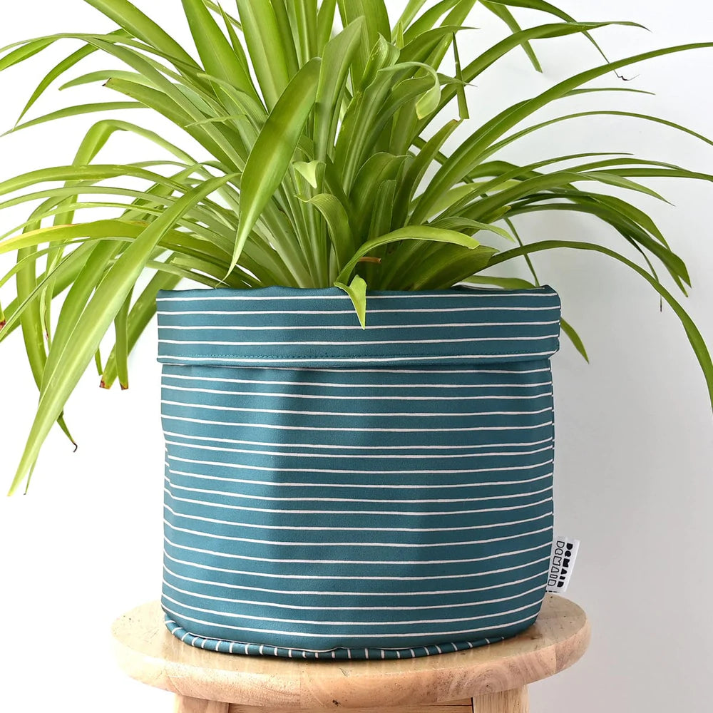 Cache pot en tissu horizon vert profond.